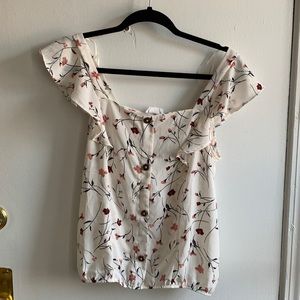 Floral cap-sleeved shirt. Tags still on!